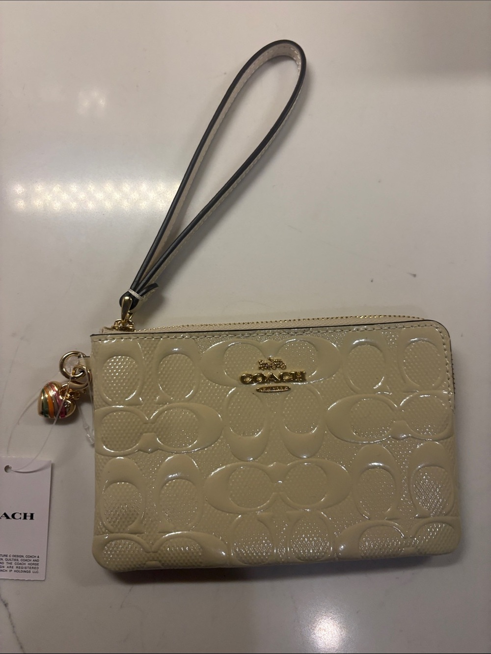 Coach Cream Patent Leather Wristlet with Gold Hardware